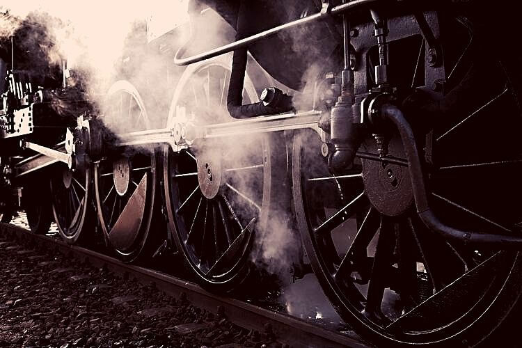 Steam Engine Wheels on Track with Steam